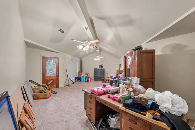 a room with furniture and wooden floor