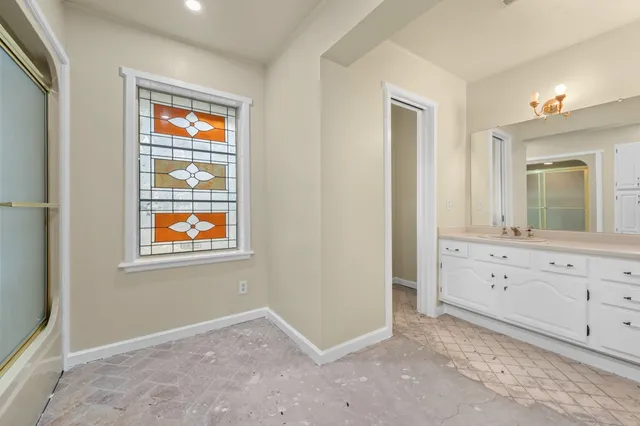 a view of an empty room and window