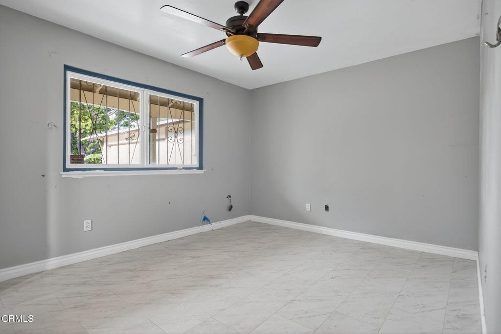 1430 Huntswood Way Oxnard, CA 93030 - Photo 8 of 12 a view of an empty room with a window