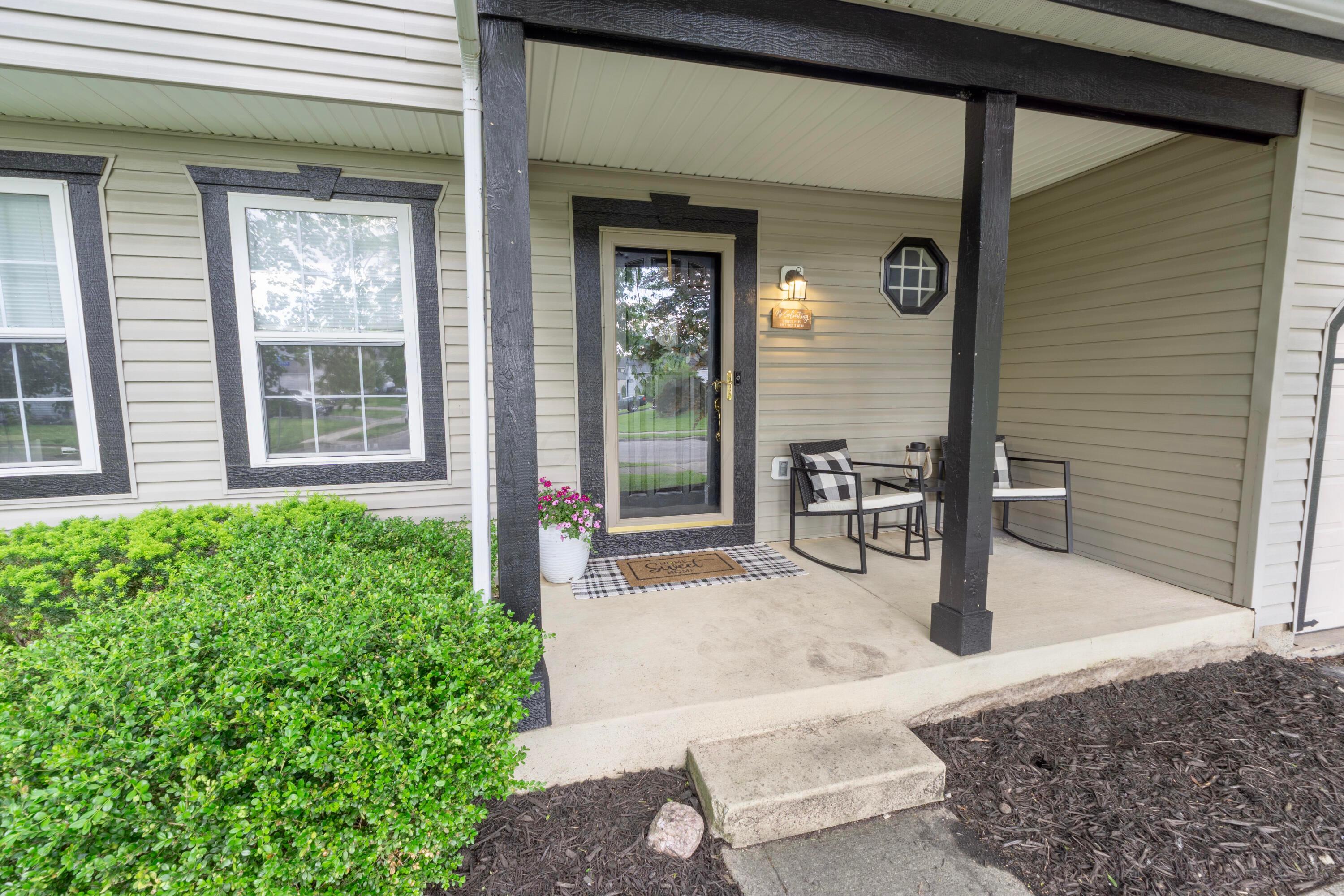 160 Kettering Bend Delaware, OH 43015 - Photo 3 of 49 Spacious covered front porch. Full glass storm door.