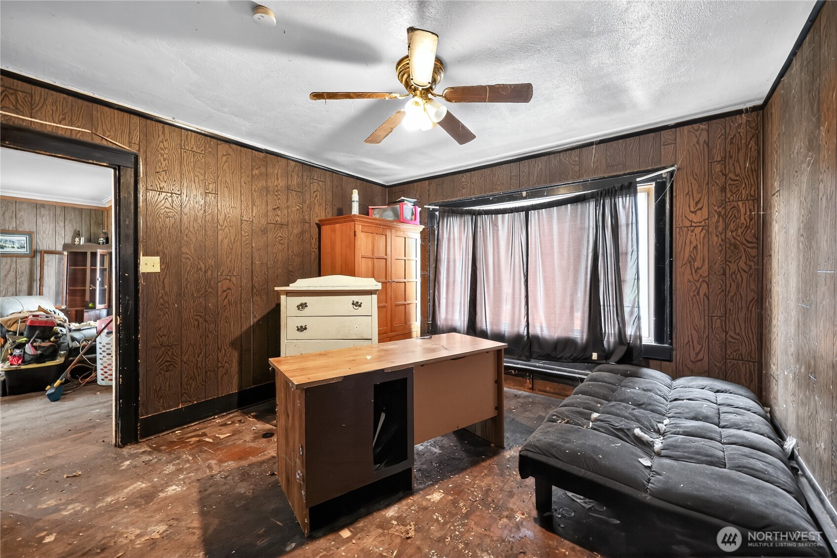 407 O Street Hoquiam, WA 98550 - Photo 31 of 31 a bed room with a bed and a chandelier