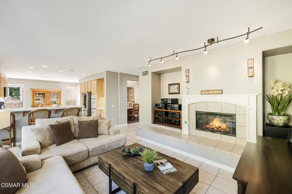 a living room with furniture or fireplace and a flat screen tv