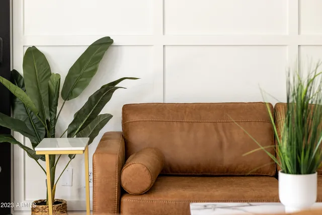 a kitchen with a sink a stove and cabinets