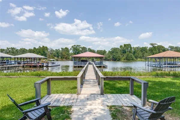 a view of a lake with a garden