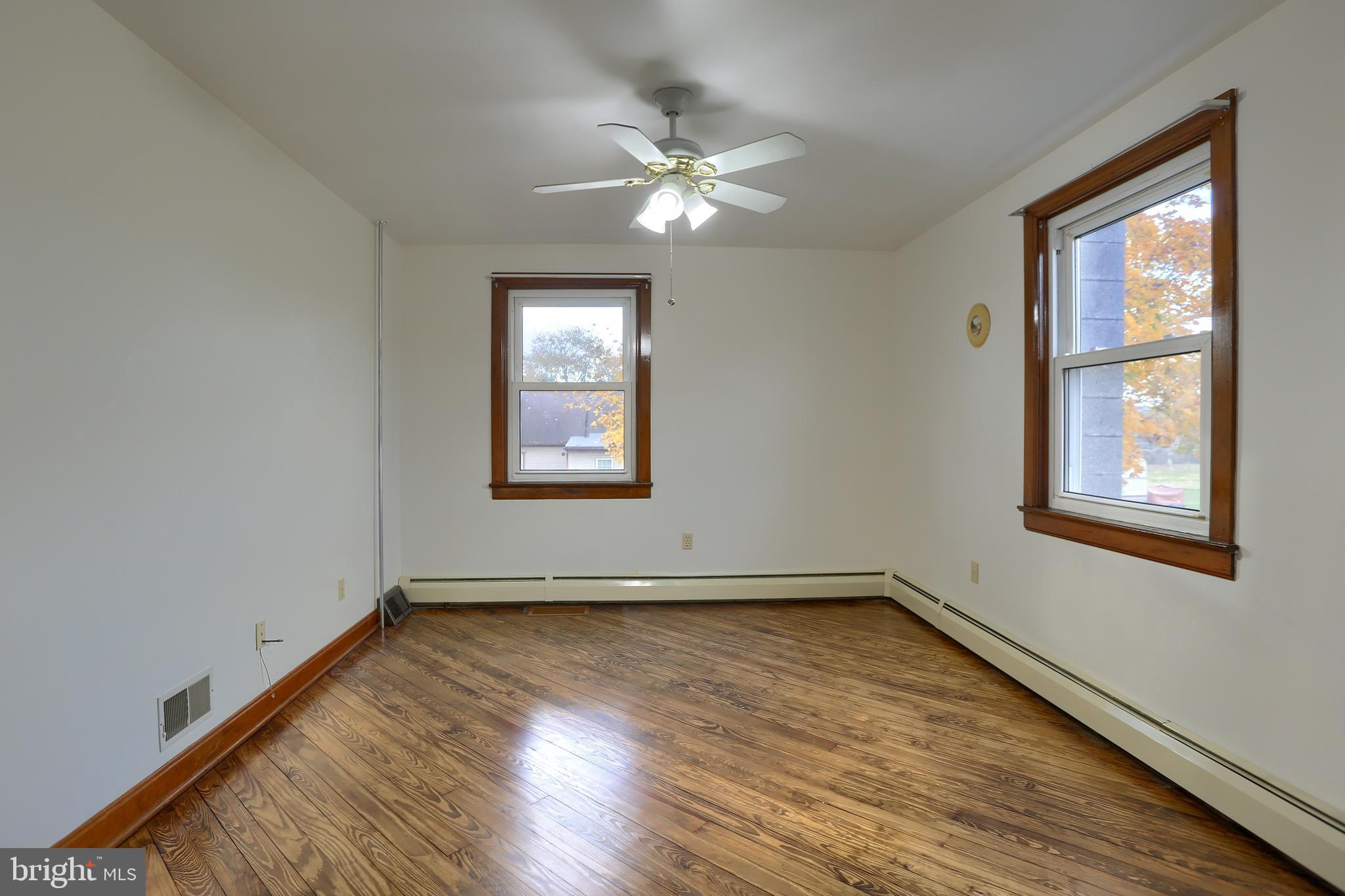 338 Locust Street Halifax, PA 17032 - Photo 17 of 43 wooden floor in an empty room with a window