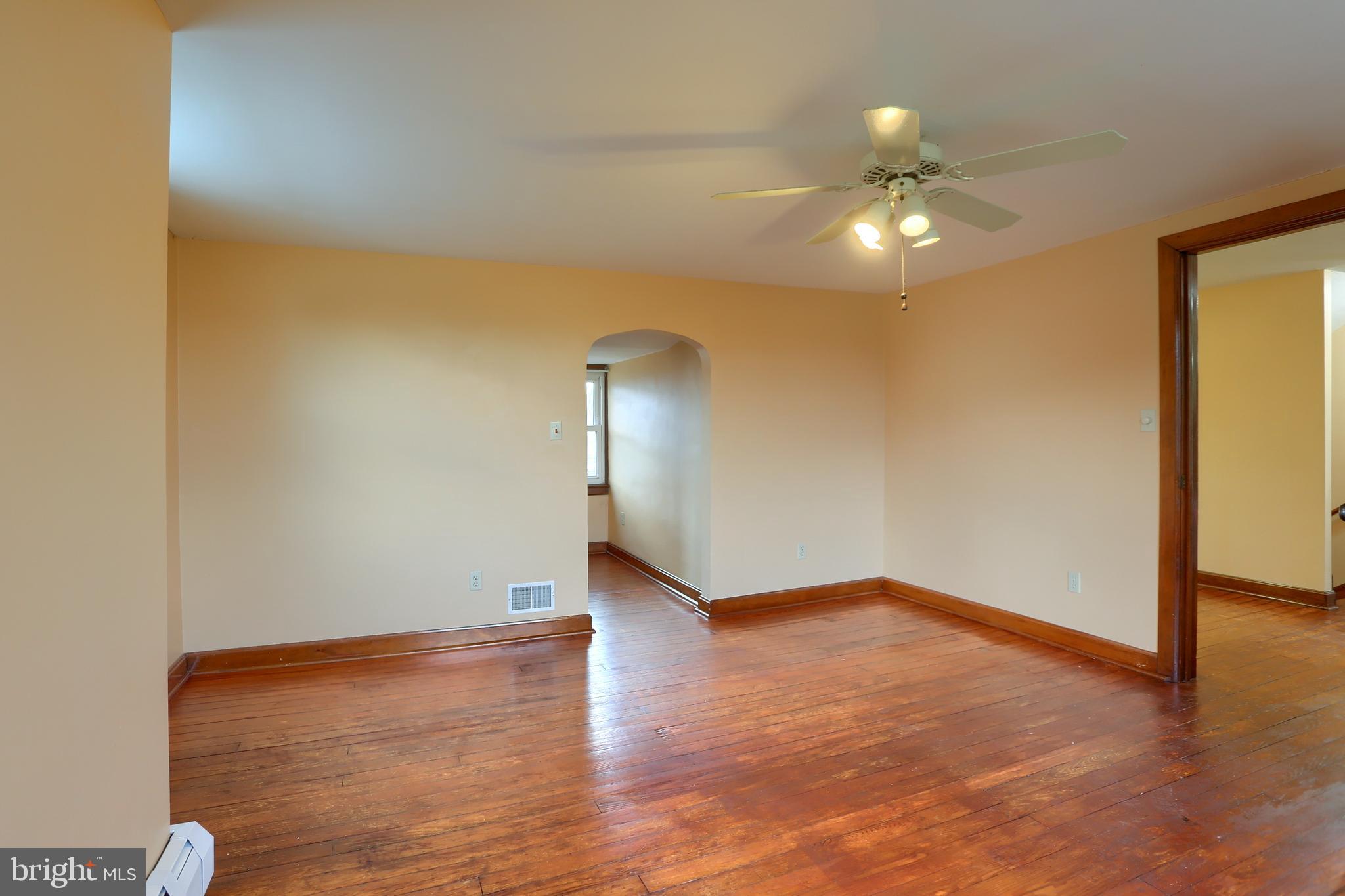 338 Locust Street Halifax, PA 17032 - Photo 31 of 43 a view of empty room with wooden floor