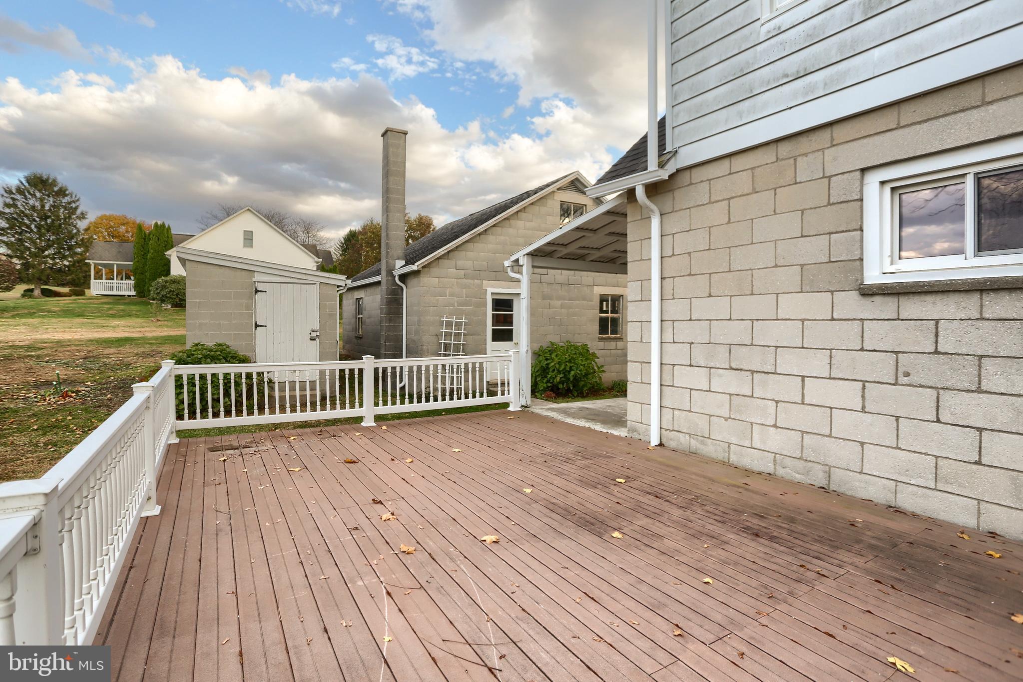 338 Locust Street Halifax, PA 17032 - Photo 37 of 43 a view of a house with a wooden deck