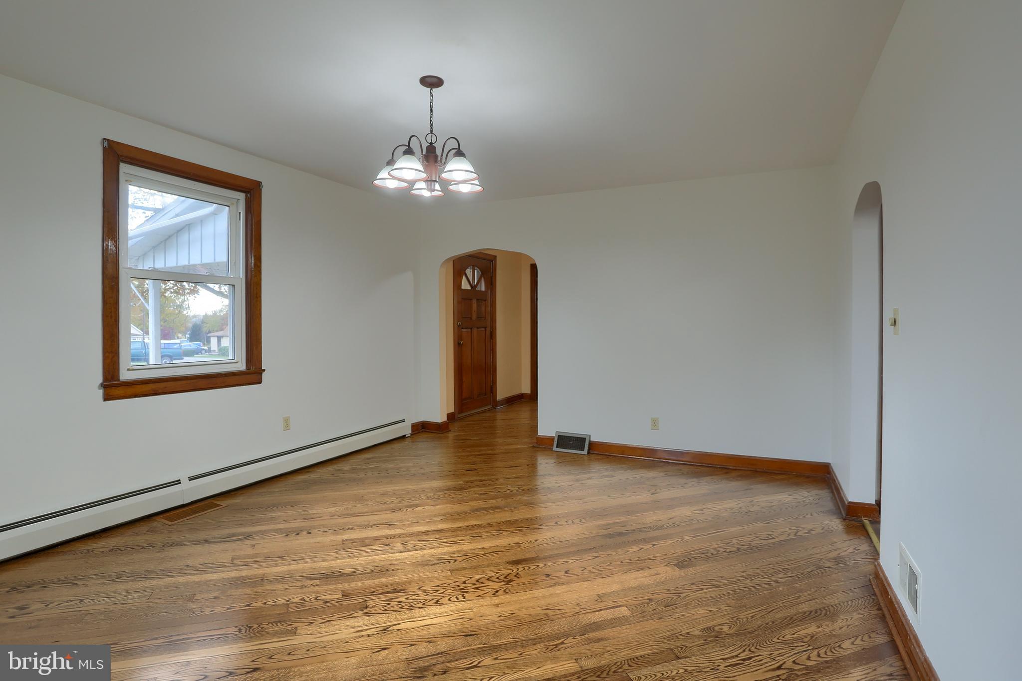 338 Locust Street Halifax, PA 17032 - Photo 10 of 43 a view of empty room with wooden floor