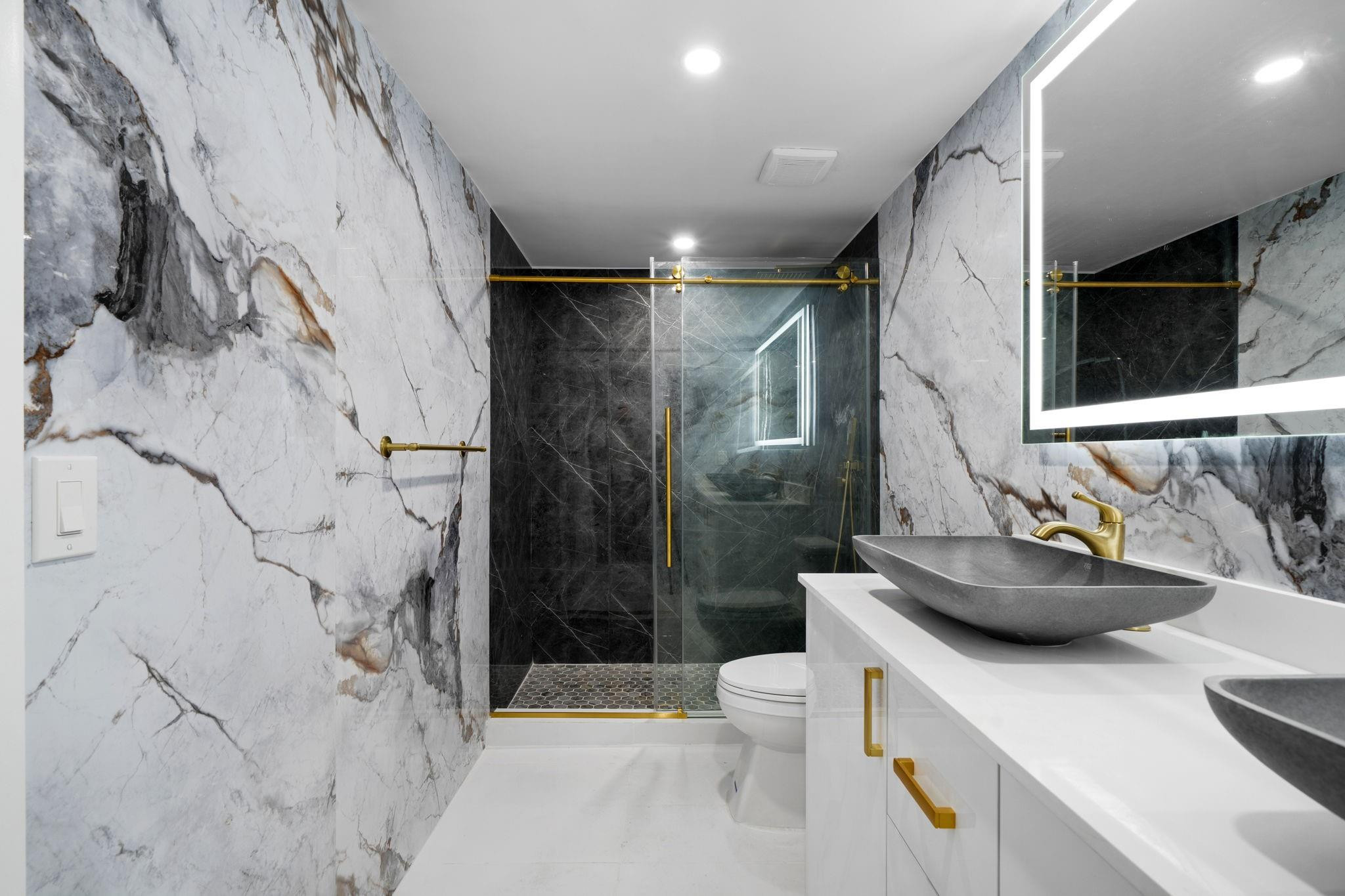823 Southwest 27th Street Fort Lauderdale, FL 33315 - Photo 15 of 56 a bathroom with a sink toilet and shower