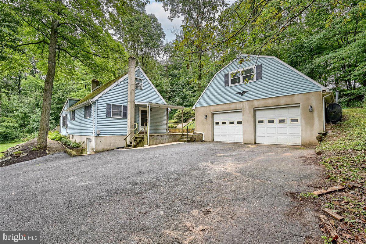1887 Cider Press Road Manheim, PA 17545 - Photo 1 of 38 a view of a house with a yard and large tree