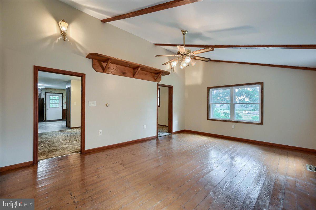 1887 Cider Press Road Manheim, PA 17545 - Photo 17 of 38 a view of an empty room with window and wooden floor