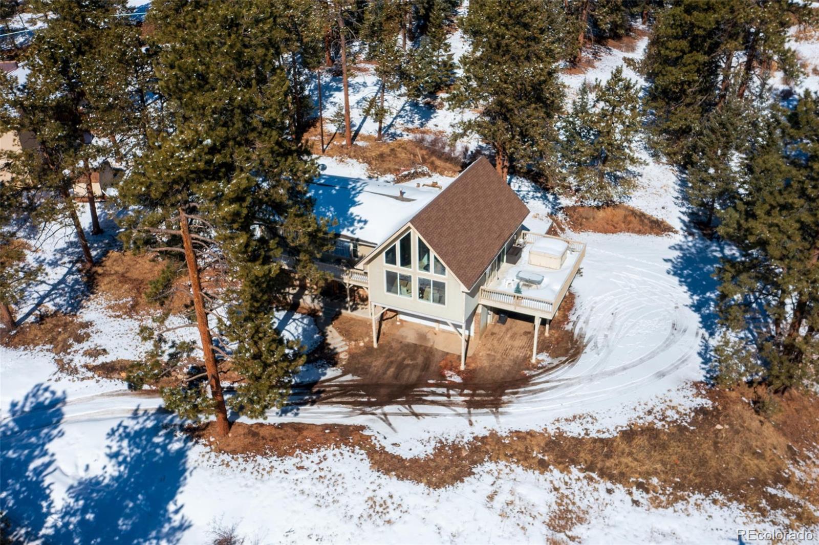 25681 Mosier Circle Conifer, CO 80433 - Photo 4 of 29 a top view of a house with a yard