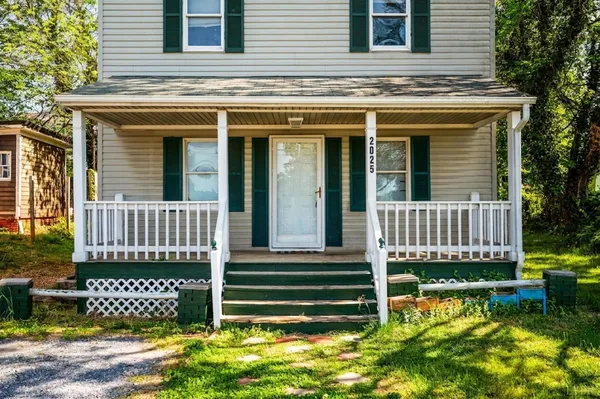 front view of a house with a deck