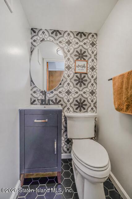 101 Beach Street Staten Island, NY 10304 - Photo 10 of 20 a bathroom with a toilet and a sink