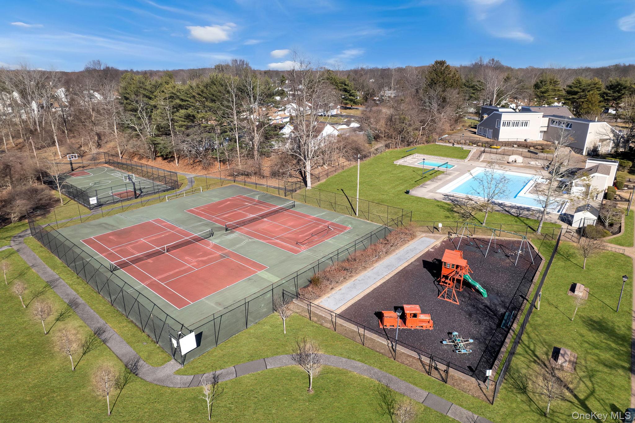 11 Chipmunk Trail Coram, NY 11727 - Photo 20 of 21 an aerial view of residential houses with outdoor space and seating area
