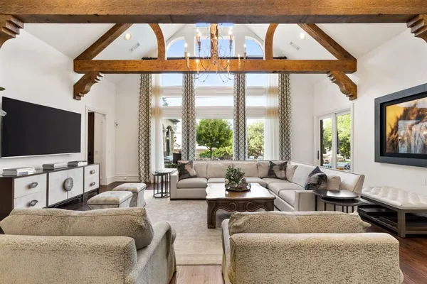 a view of balcony with wooden floor