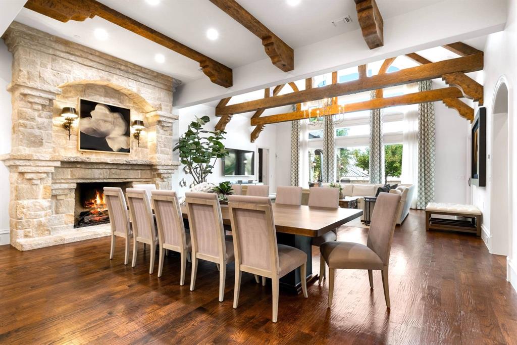 6413 Old Gate Road Plano, TX 75024 - Photo 14 of 38 a view of a dining room with furniture and wooden floor
