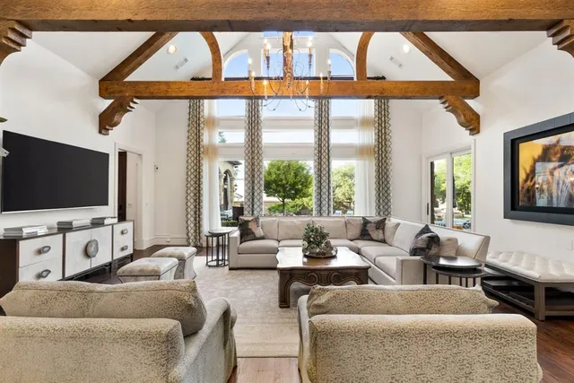 a view of balcony with wooden floor