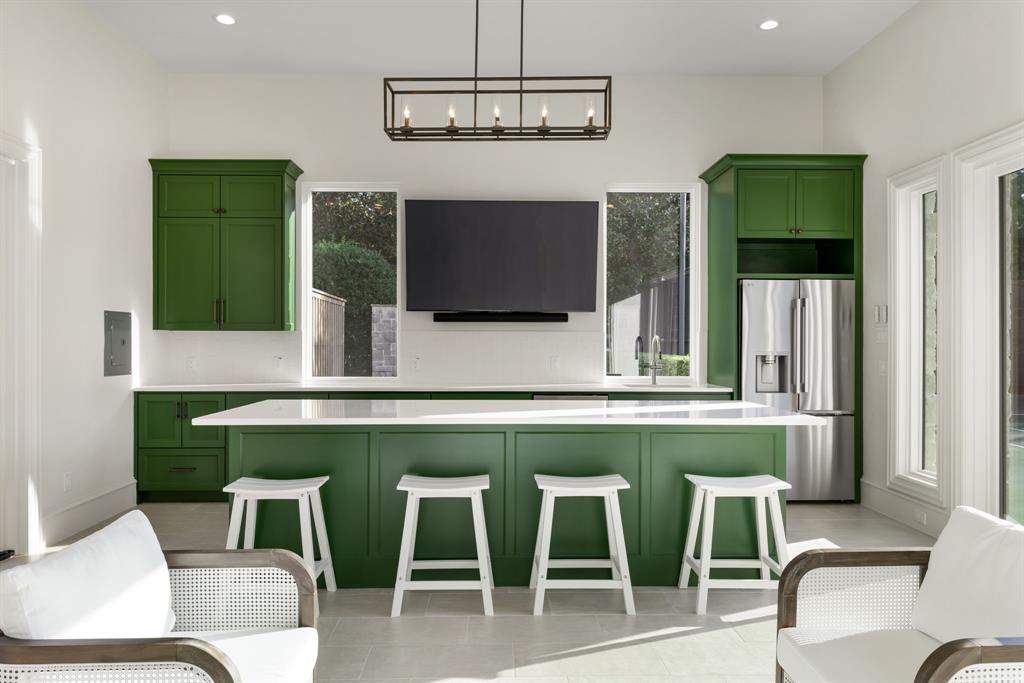 6413 Old Gate Road Plano, TX 75024 - Photo 34 of 39 Natural light from multiple windows and a glass door leading outside.