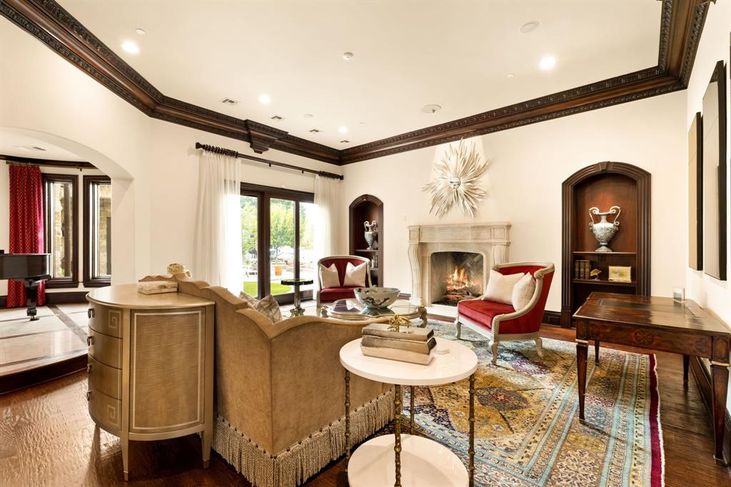 6413 Old Gate Road Plano, TX 75024 - Photo 7 of 38 a living room with fireplace furniture and a large window
