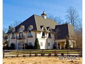 2170 Rock Road Rutherfordton, NC 28139 - Photo 1 of 17 a front view of a house with large windows