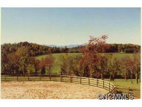2170 Rock Road Rutherfordton, NC 28139 - Photo 6 of 17 a view of a lake with a mountain in the background