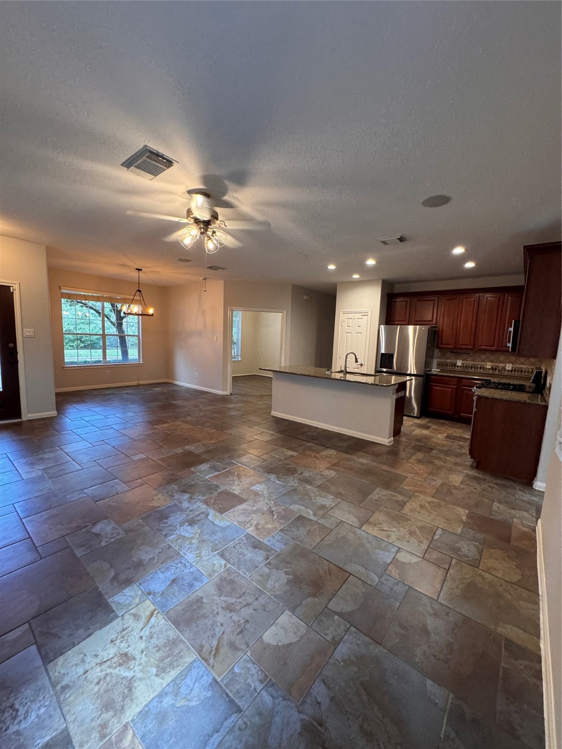 137 East Montfair Boulevard Spring, TX 77382 - Photo 2 of 23 a view of a kitchen with a stove