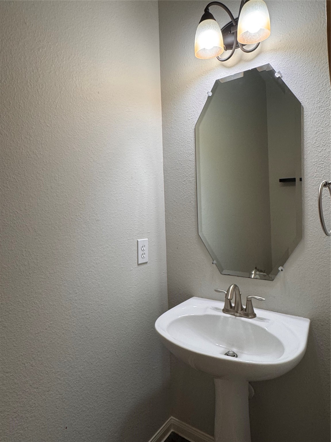 137 East Montfair Boulevard Spring, TX 77382 - Photo 6 of 23 a bathroom with a sink and a mirror