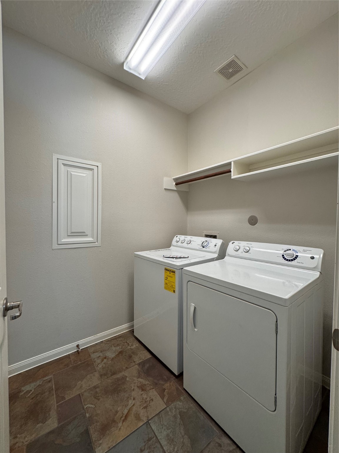 137 East Montfair Boulevard Spring, TX 77382 - Photo 7 of 23 a utility room with dryer and washer