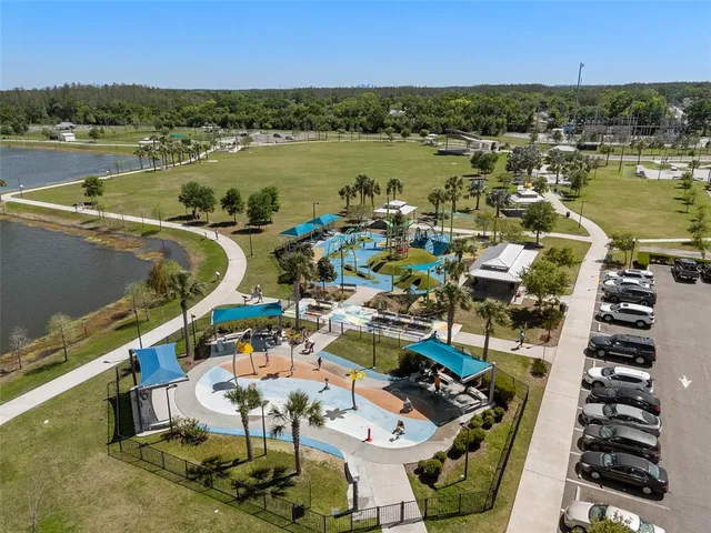 an aerial view of a city with lake view