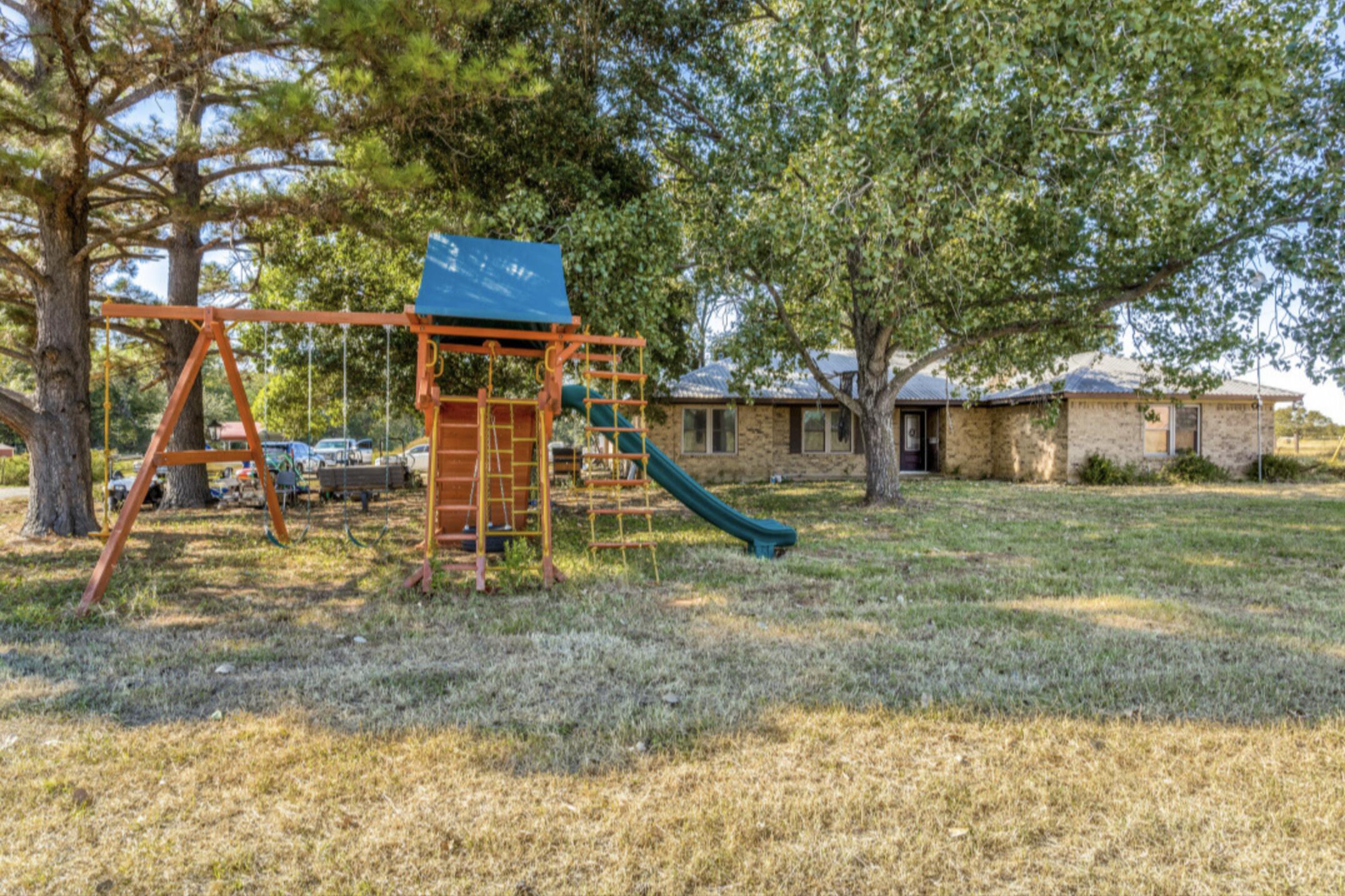 View of playground with a​​‌​​​​‌​​‌‌​‌‌​​‌​​​​‌​​​‌‌​‌‌‌ yard