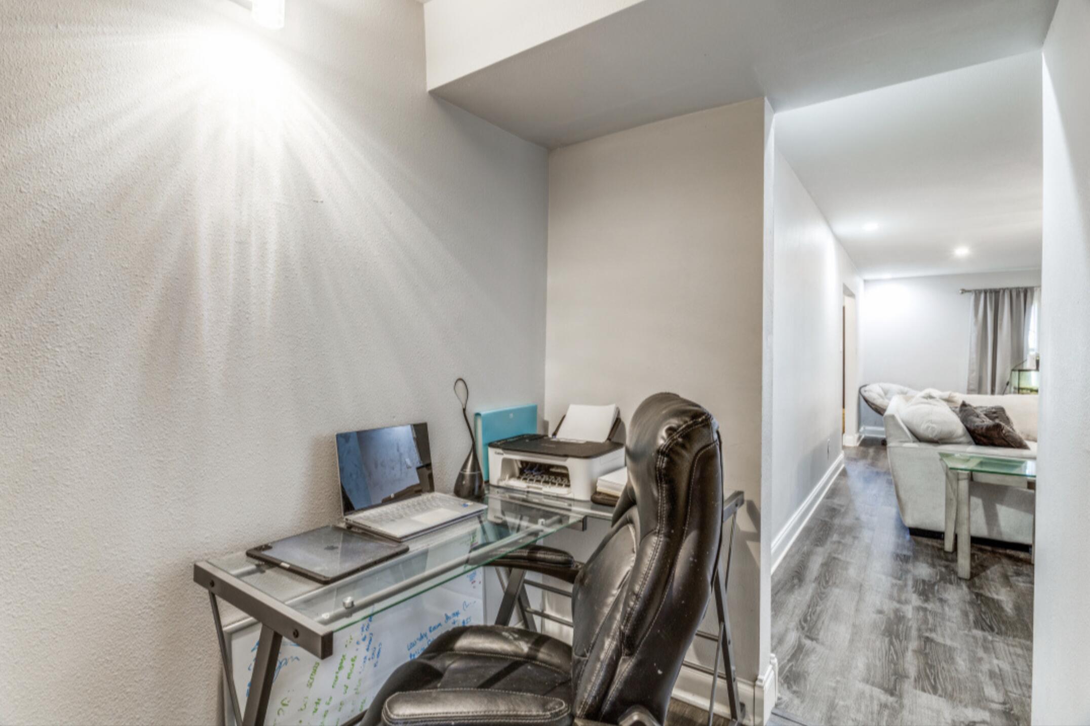 610 Pleasant Grove Road Elgin, TX 78621 - Photo 13 of 25 Home office with wood finished floors and baseboards