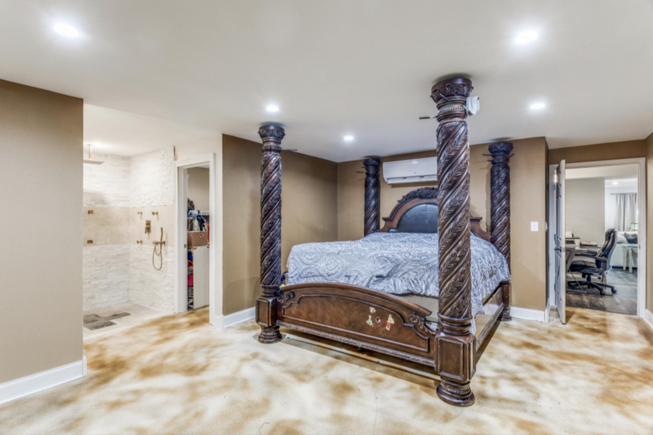 610 Pleasant Grove Road Elgin, TX 78621 - Photo 14 of 25 Bedroom featuring carpet floors, recessed lighting, and connected bathroom
