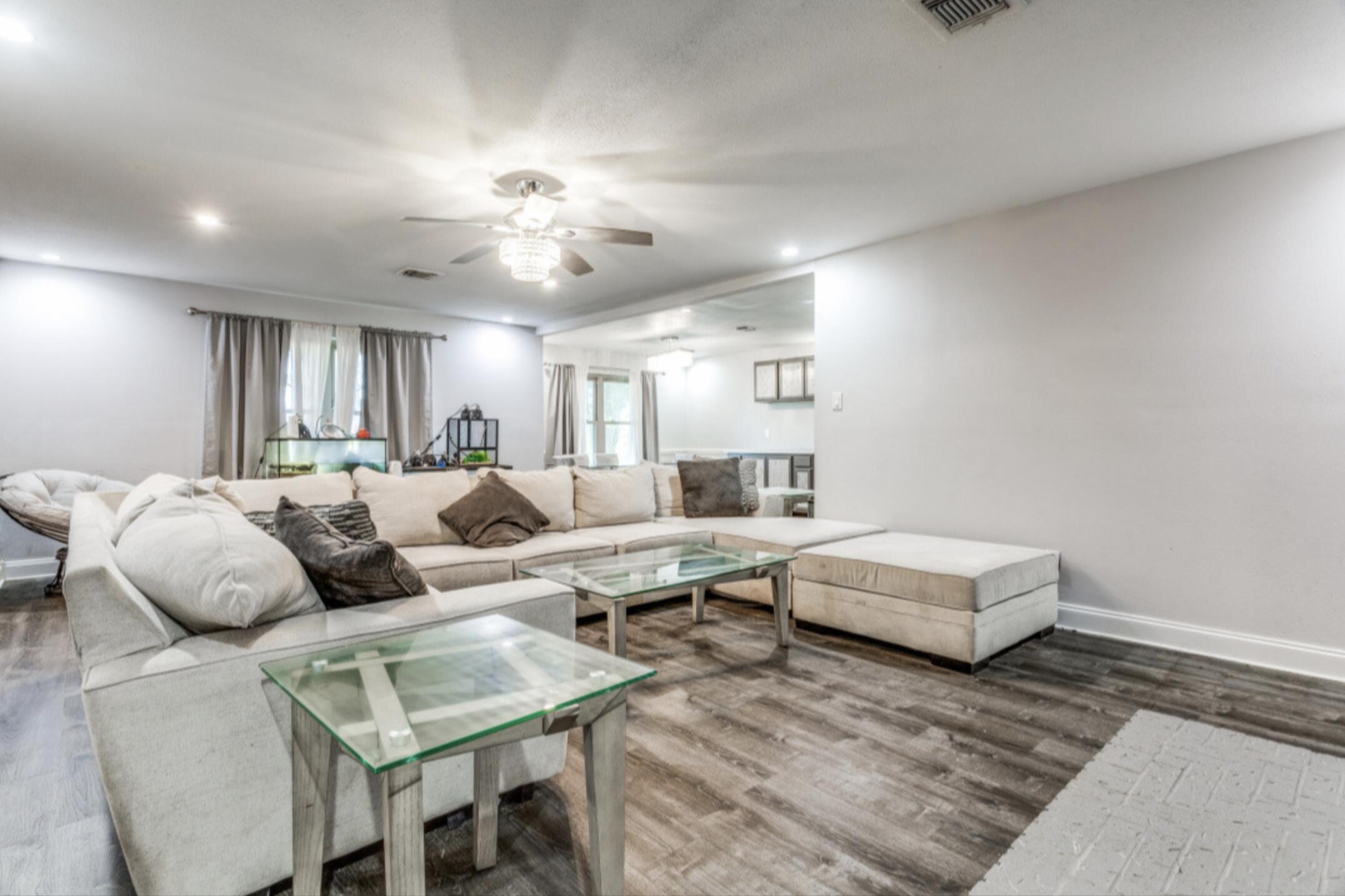 610 Pleasant Grove Road Elgin, TX 78621 - Photo 6 of 25 Living room featuring wood finished floors, ceiling fan, and recessed lighting