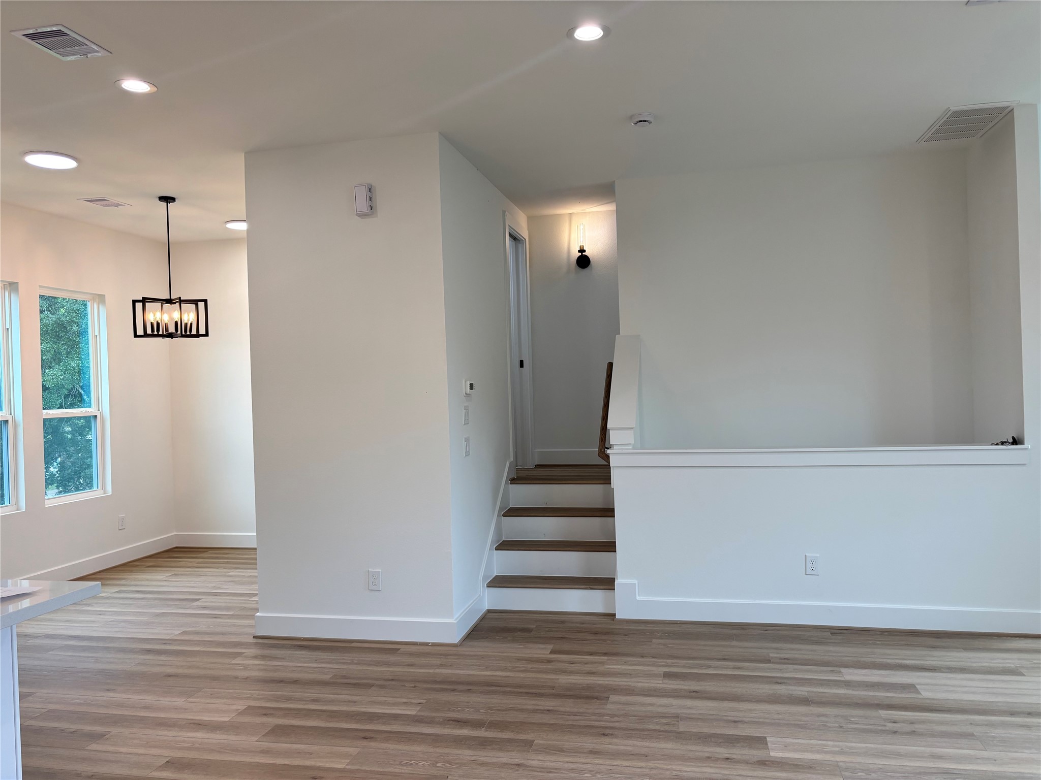 1034 Marcolin Street Houston, TX 77088 - Photo 14 of 25 a view of an entryway with wooden floor