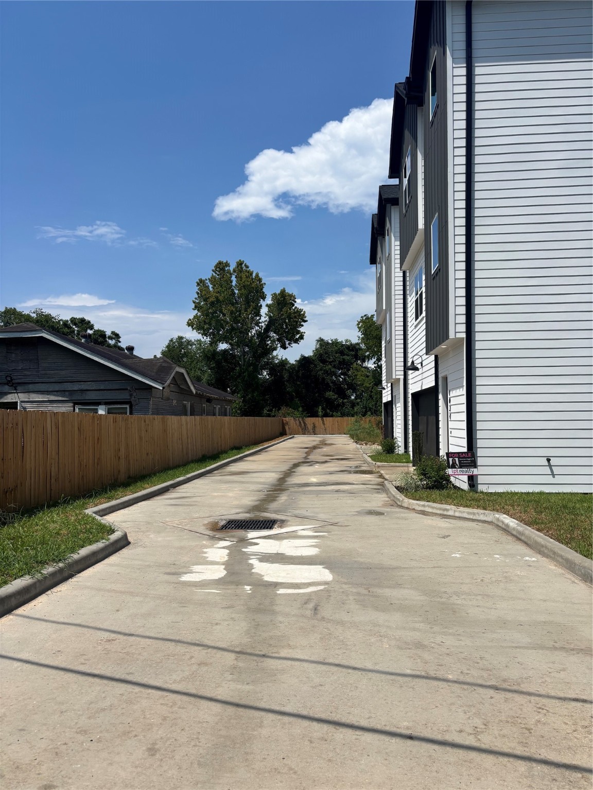 1034 Marcolin Street Houston, TX 77088 - Photo 18 of 25 Driveway leading into Marcolin Manor