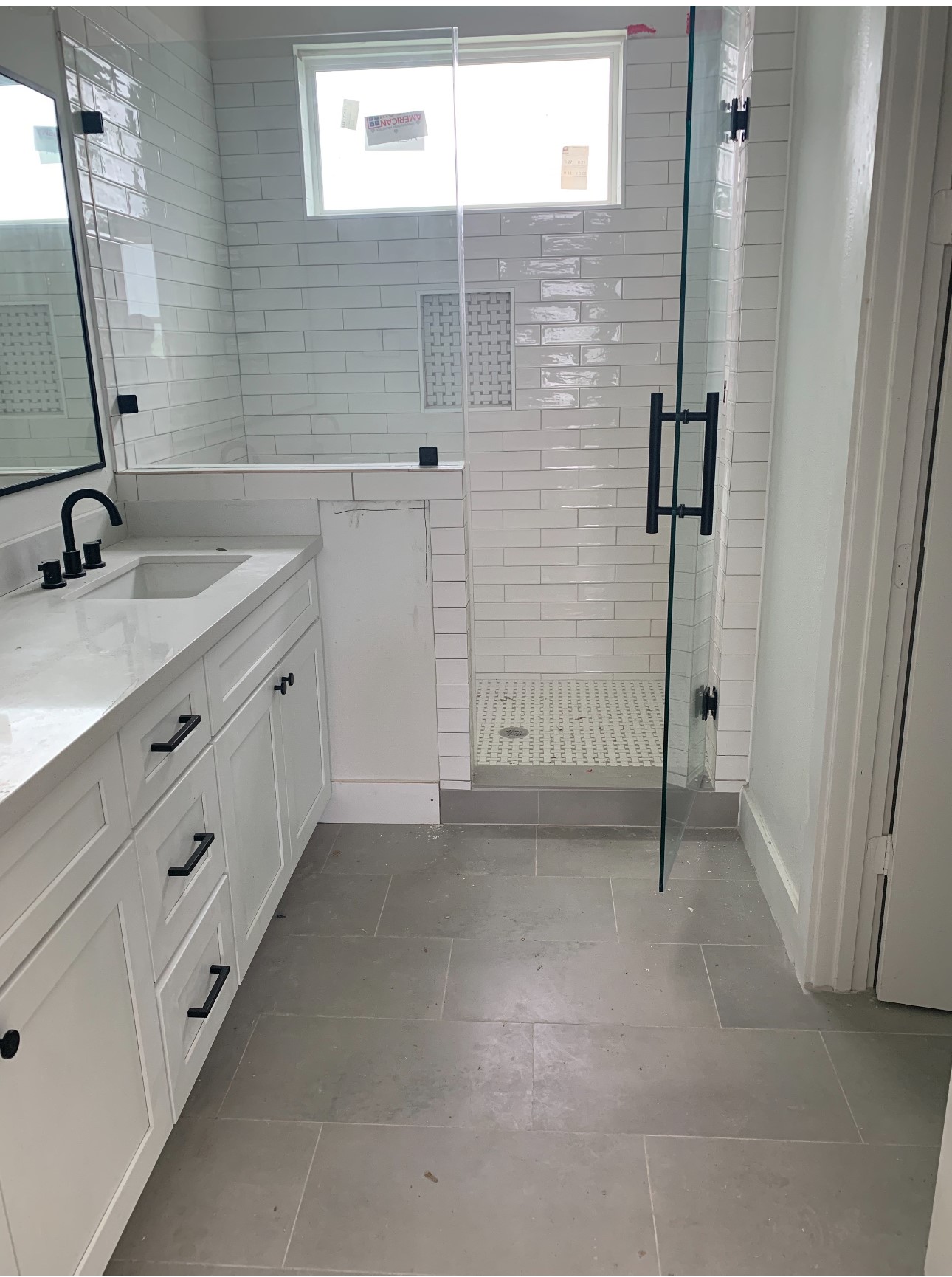 1034 Marcolin Street Houston, TX 77088 - Photo 2 of 25 a bathroom with a sink and a mirror