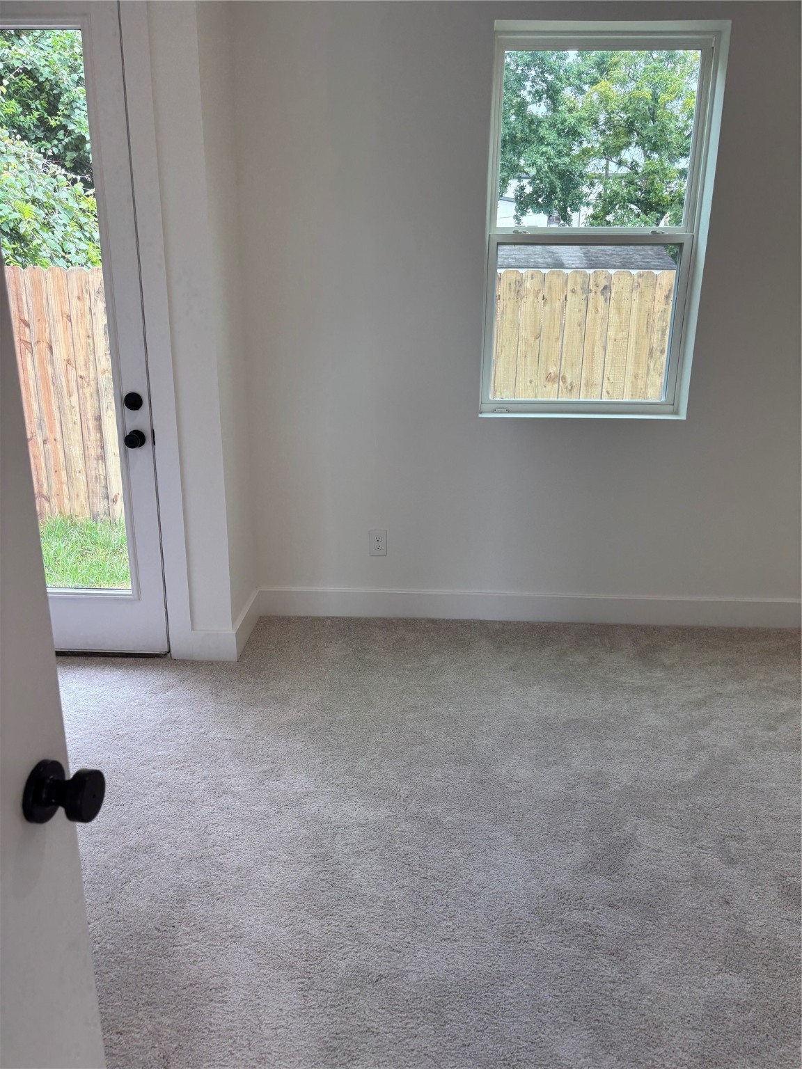 1034 Marcolin Street Houston, TX 77088 - Photo 21 of 25 1st Floor bedroom with backdoor access and full bath