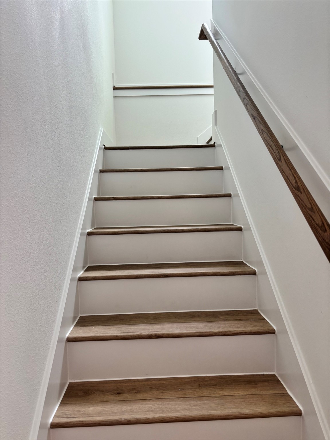 1034 Marcolin Street Houston, TX 77088 - Photo 23 of 25 Wood stairs no carpet