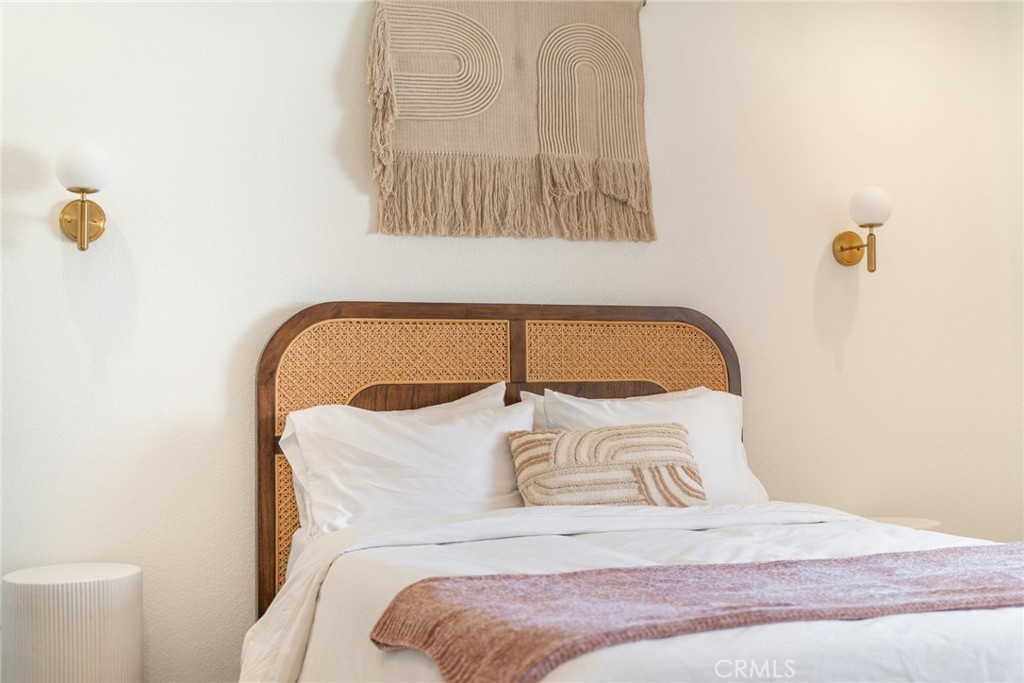 57508 Buena Suerte Road Yucca Valley, CA 92284 - Photo 37 of 61 a bedroom with a bed and a dresser