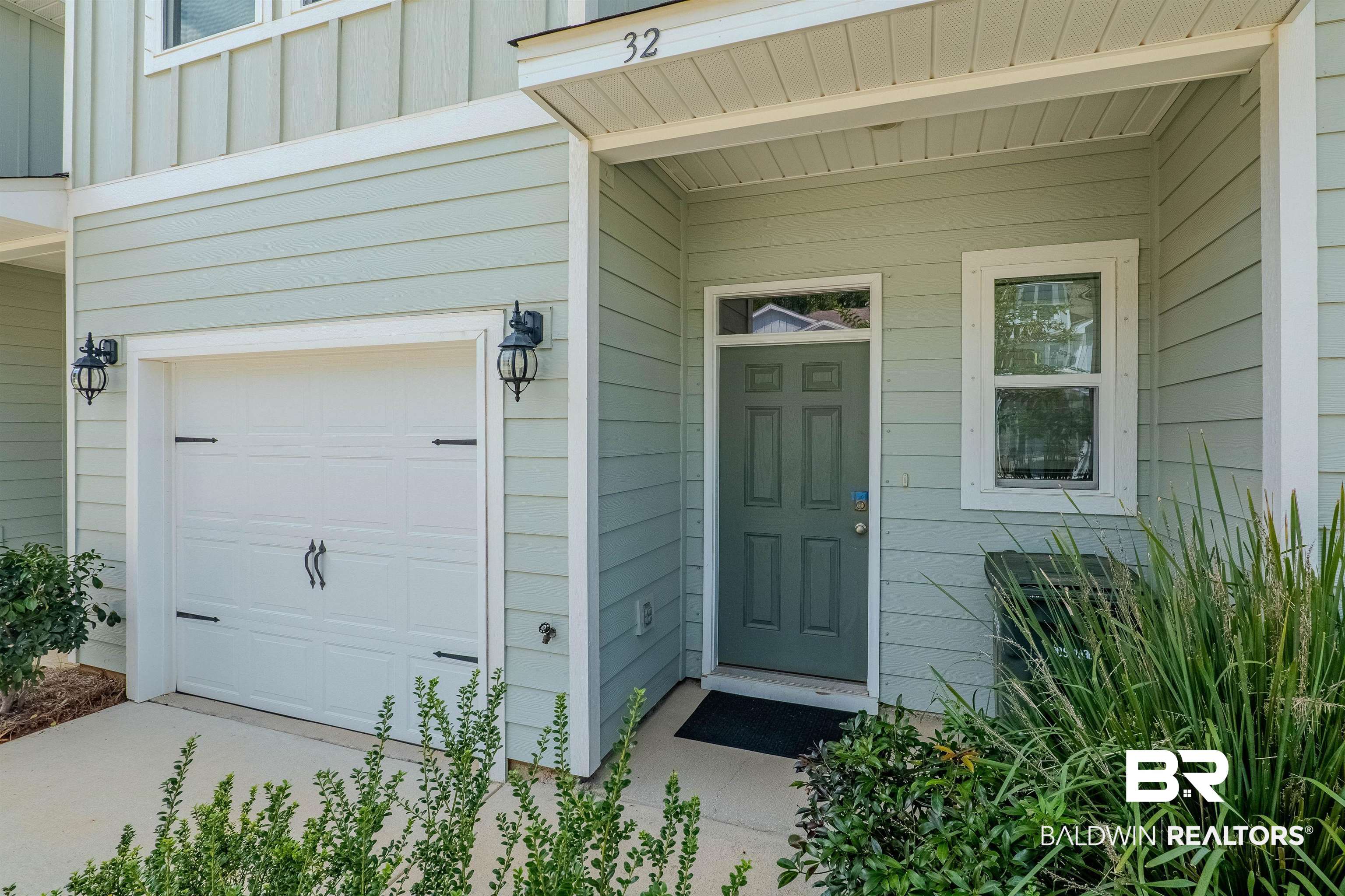 25806 Pollard Road, Unit 32 Daphne, AL 36526 - Photo 2 of 23 Entrance to property featuring a garage
