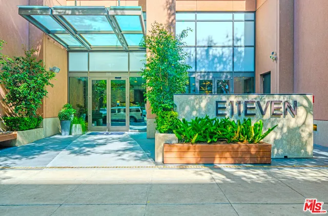 a house with a yard and a potted plant