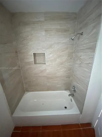 a bathroom with a bathtub