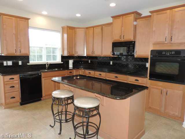 3077 Sycamore Point Trail High Point, NC 27265 - Photo 8 of 16 Kitchen. 6 ft. granite island