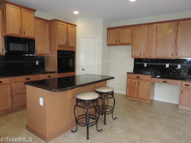 3077 Sycamore Point Trail High Point, NC 27265 - Photo 9 of 16 Kitchen. Walk-in Pantry and Desk Area