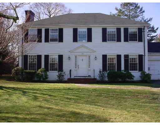 185 Adams Milton, MA 02186 - Photo 1 of 2 a front view of a house with a yard