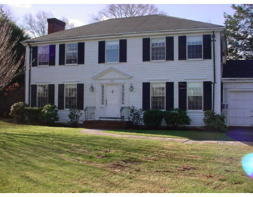 185 Adams Milton, MA 02186 - Photo 2 of 2 a front view of a house with a yard
