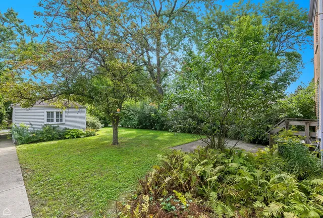 a house view with a garden space