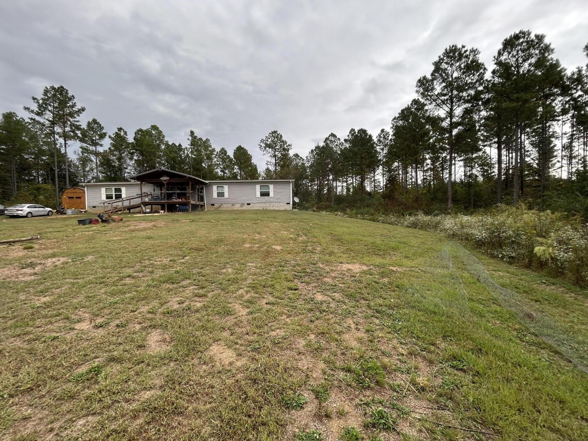 145 Pinhook Road Calhoun, TN 37309 - Photo 24 of 30 a swimming pool with trees in the background