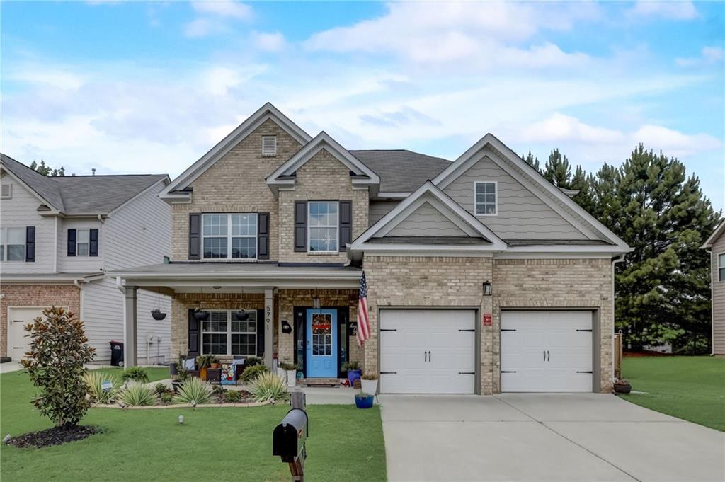 5791 Savannah River Road Atlanta, GA 30349 - Photo 1 of 1 a front view of house with yard and green space